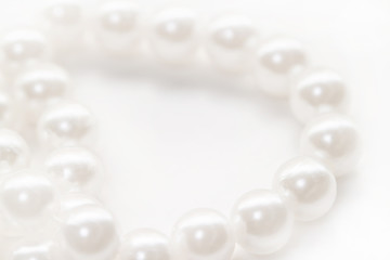 White pearl beads isolated background