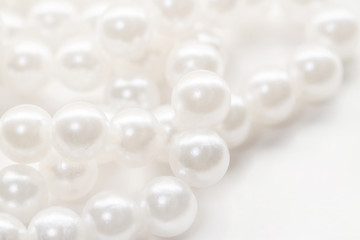 Bunch small pearl beads isolated white background