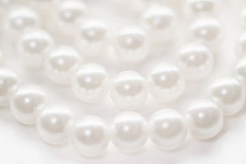 Pearl beads strings isolated white fashion background