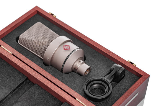 Uzhgorod, Ukraine - December 1, 2019: Large diaphragm condenser studio microphone Neumann tlm 103 on a white background.