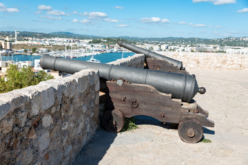 Fototapeta na wymiar Ancient bronze cannon in Ibiza