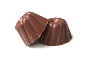 Closeup of two Chocolates in shaped kouglofs on white background