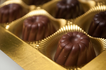 Group of Chocolates in shaped kouglofs in golden box