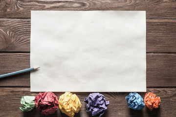 Concept of creativity and inspiration presented by blank papershit. Place your text