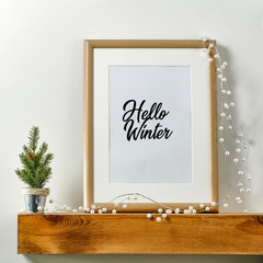 Winter background of frame with free space for your decoration.Wooden shelf on wall and copy space 
