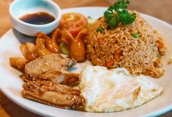 fried rice with egg, sausage, chicken wing