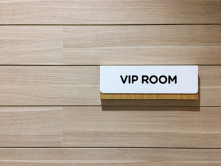 VIP room sign on wall in front of a room