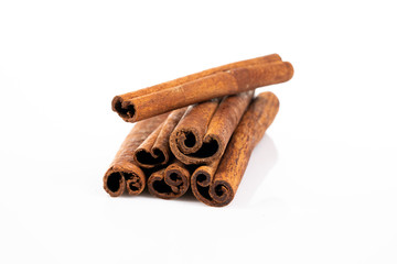 cinnamon sticks on white background