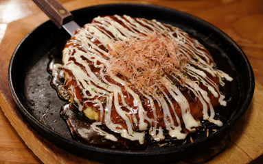 delicious okonomiyaki on wood table