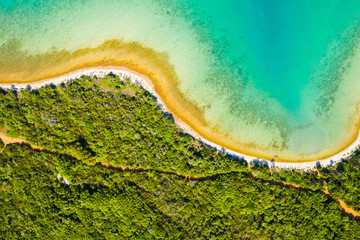 Adriatic coast in Croatia, pine forest and blue lagoon on Dugi Otok