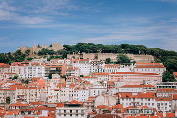 A small boat in a large city. High quality photo