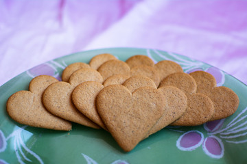 Close-up of sweet cookies with a heart shape, precious detail for Valentine.