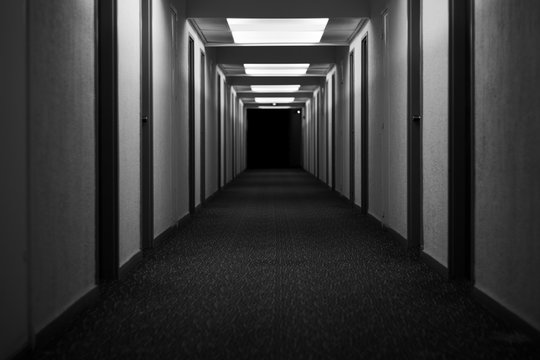 hotel corridor hallway abandoned creepy black and white