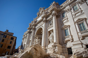 Trevi Fountain in Rome as seen from the bottom of it looking up into the sky