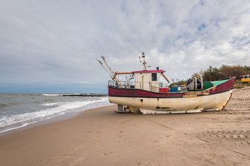 Fishing boats on the beach of the Baltic Sea. Jaroslawiec, Poland