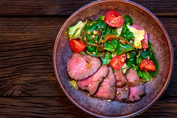 Freshly cooked delicious roast beef sliced in pieces