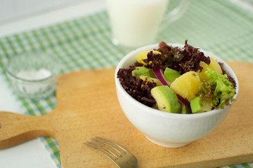 Dietary salad of potatoes, avocado and red onion. A healthy and light salad is suitable for lunch or lunch.