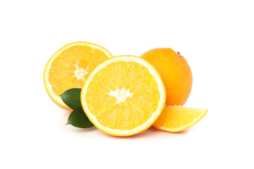 Juicy oranges and leaves isolated on white background
