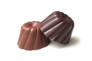 Closeup of two Chocolates in shaped kouglofs on white background