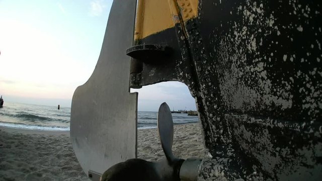 Fising boat,s propeler on the beach