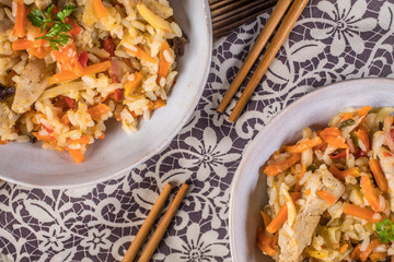 Fried chicken with rice and vegetables.
