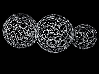 Three metal silver balls isolated on black background