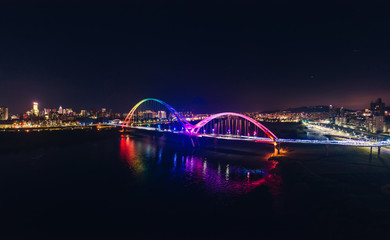 Crescent Bridge - landmark of New Taipei, Taiwan with beautiful illumination at night, photography in New Taipei, Taiwan.