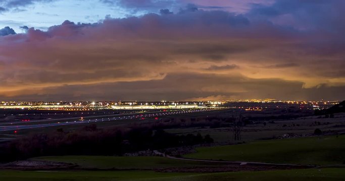 Timelapse Madrid - Barajas Airport at night, take off planes. Madrid, Spain