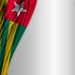 Flag of Togo against gray gradient background