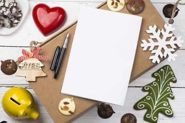 Christmas wish list or costs concept with empty sheet and pencil to add copy