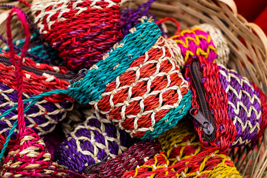 Handmade colorful purses made from quality Abaca plant fiber, crafted by indigenous people in the south of the Philippines. Animal free items. Selected focus. Copy space. 