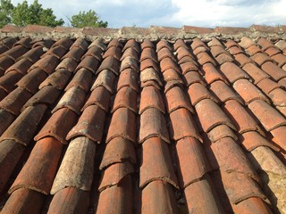 Roof in the foreground with brick tiles
