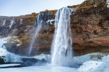 Iceland seljalandsfoss waterfall, winter in Iceland, seljalandsfoss waterfall in winter