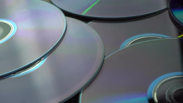 old compact discs on the table