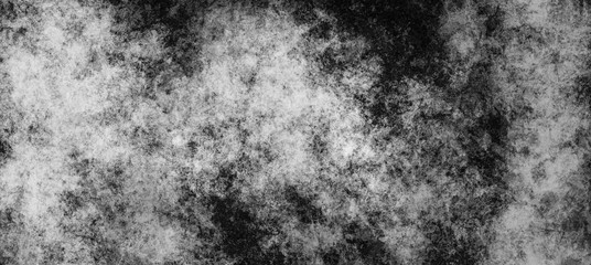Fototapeta na wymiar Abstract modern black and white monochrome gritty grunge background texture