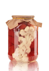 Various vegetables in a jar prepared for home canning