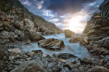 The rocks of the bay of Rovaglioso, in the purple coast.