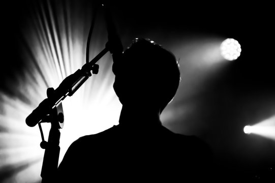 Back lit lead singer in black and white