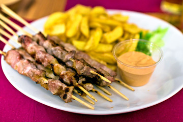 Typical italian meal made of Abruzzo kebabs or 