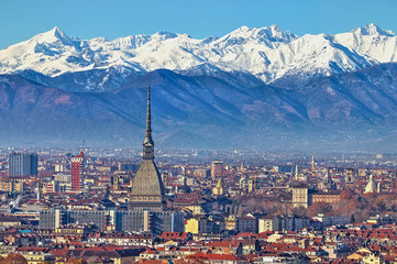 Aerial panoramic winter view on Turin city center with Mole Antonelliana, modern skyscrapers and...