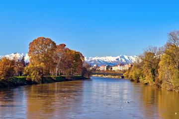 Fototapeta na wymiar Scenic view along the Po river in Turin, Italy, in a clear blue sky winter morning