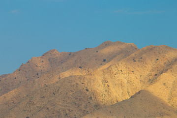 Rocks, trees and blue sky