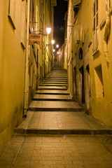 Nice, France - December 02, 2019: night views in the Nice old town narrow street and alleys. Selective focus