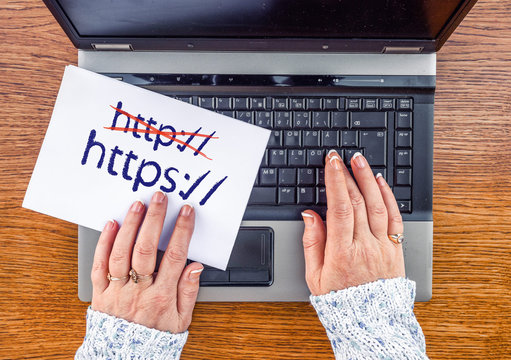 woman hands on laptop and https, Crossed Out http on paper sheet