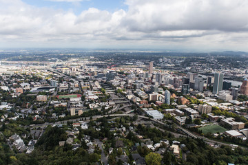 Fototapeta na wymiar Aerial view of the buildings, homes, streets and bridges near downtown Portland, Oregon, USA.