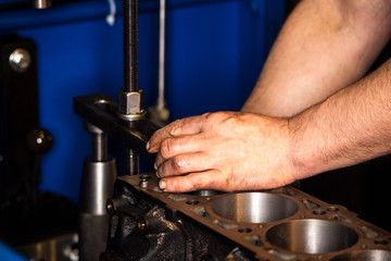 Car engine repair at the factory.