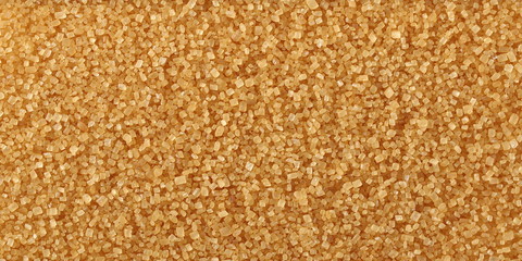 Brown cane sugar background and texture, macro