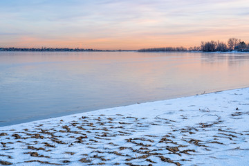dusk over frozen lake in northern Colorado