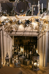 A beautiful living room with fireplace decorated for Christmas and Happy New Year