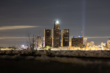 Detroit cityscape at night with spotlight